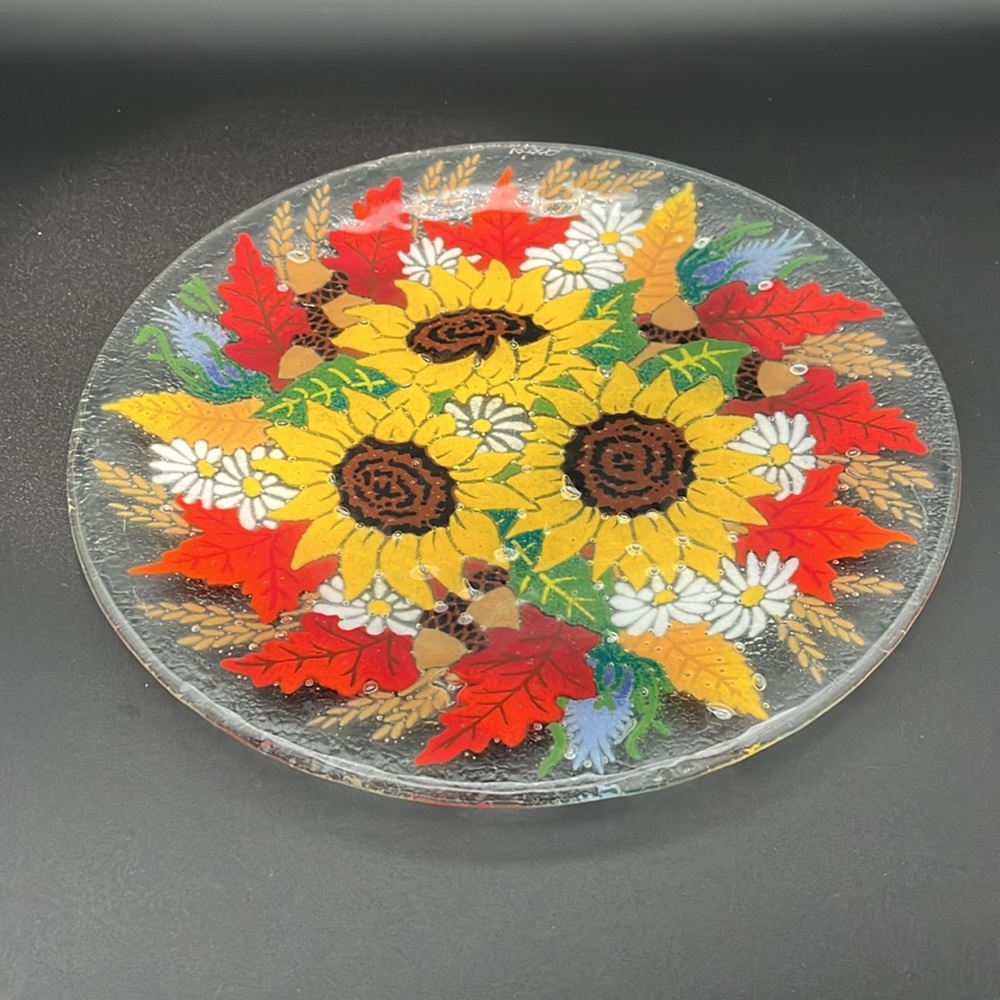 Signed Peggy Karr Autumn Sunflowers fused glass 11” plate. Beautiful colors!